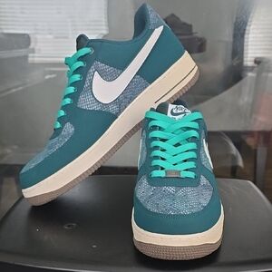Nike Teal and White Sneakers with Textured Design